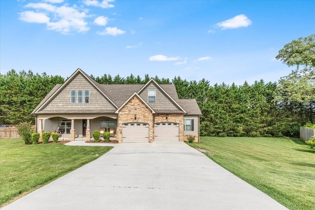 55 E Acorn Dr, Rock Spring, GA 30739 - craftsman-style home with covered porch, driveway, and stone siding