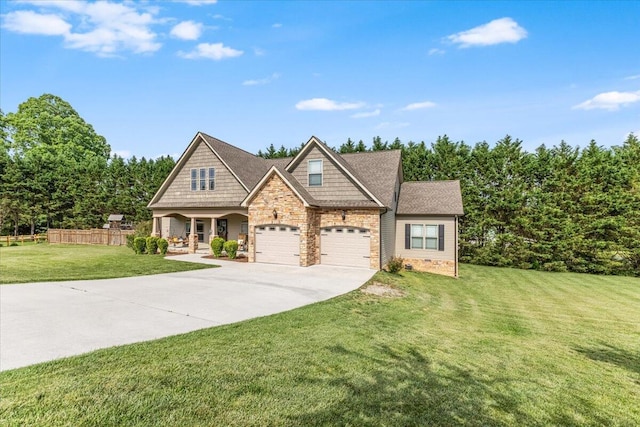 55 E Acorn Dr, Rock Spring, GA 30739 - craftsman house featuring concrete driveway, a front lawn, covered porch, a garage, and stone siding
