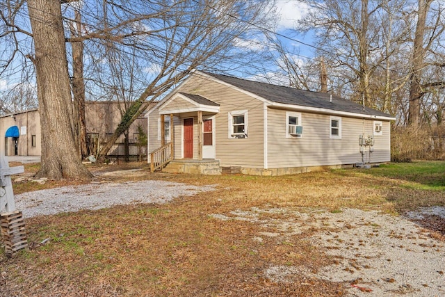 view of front of house featuring cooling unit