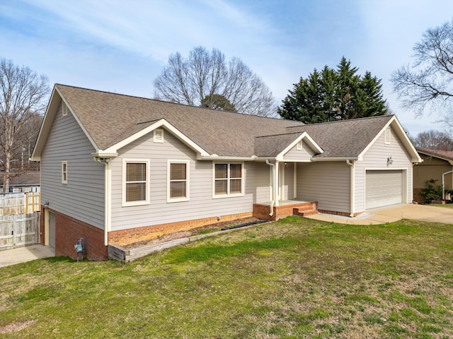 ranch-style house with a shingled roof, concrete driveway, an attached garage, fence, and a front lawn