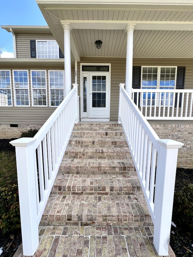 doorway to property with covered porch