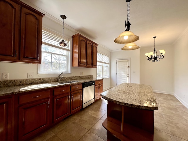 kitchen featuring a sink, hanging light fixtures, ornamental molding, stainless steel dishwasher, and a center island