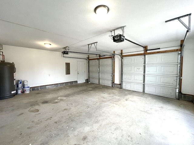 garage with water heater, electric panel, and a garage door opener