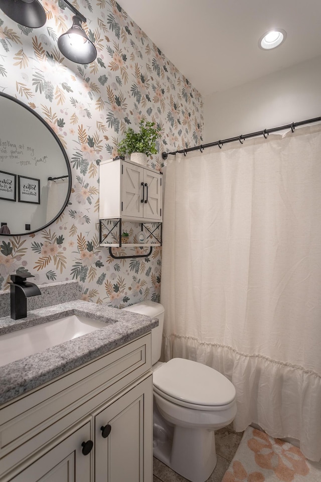 full bathroom with recessed lighting, vanity, toilet, and wallpapered walls