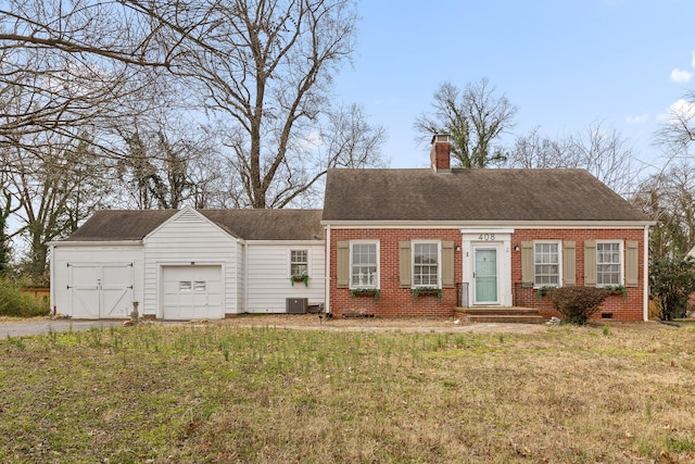 view of front of house featuring brick siding, a front lawn, a chimney, crawl space, and an attached garage