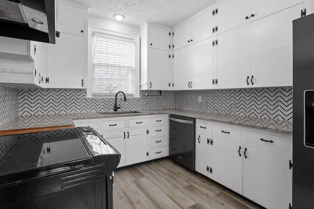 kitchen featuring decorative backsplash, dishwashing machine, open shelves, and a sink