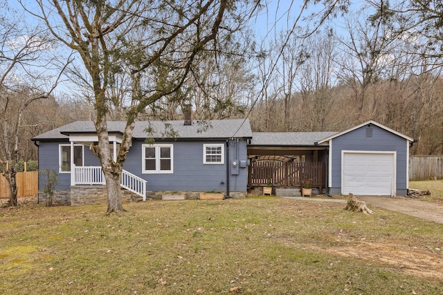 ranch-style house with a garage, driveway, a front lawn, and fence