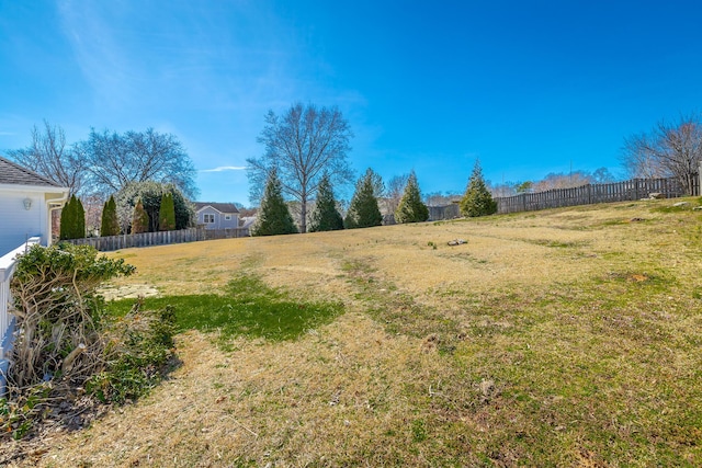 view of yard with fence