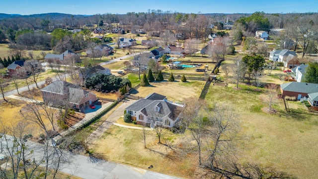 birds eye view of property with a residential view