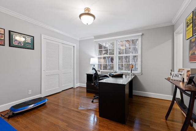 office space featuring baseboards, ornamental molding, and dark wood finished floors