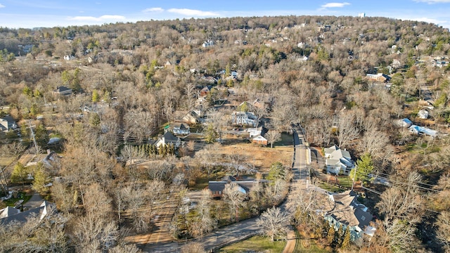 drone / aerial view with a view of trees