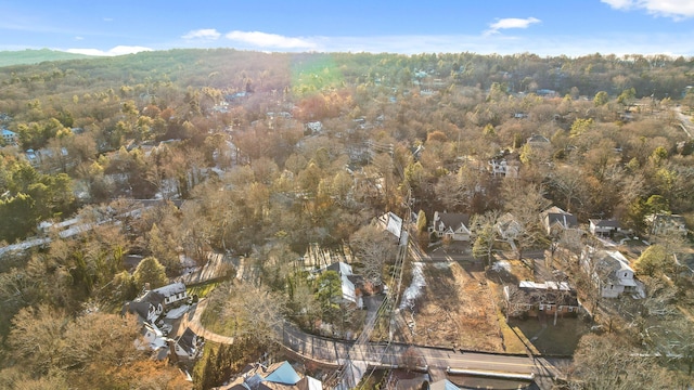 aerial view with a wooded view