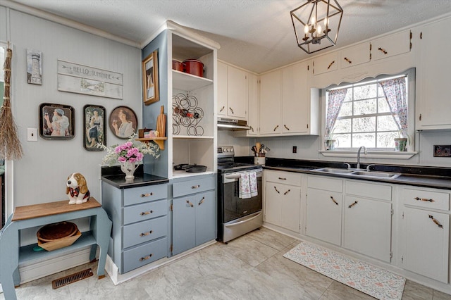 kitchen featuring dark countertops, stainless steel range with electric stovetop, under cabinet range hood, and a sink