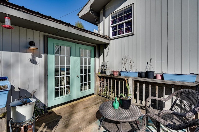 wooden deck featuring french doors