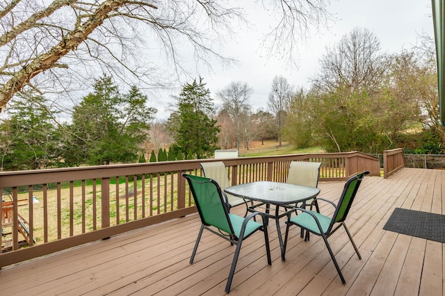 deck with outdoor dining space