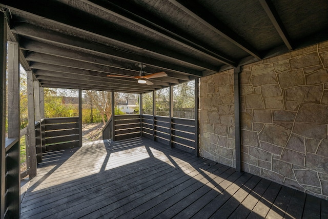 wooden deck featuring a ceiling fan