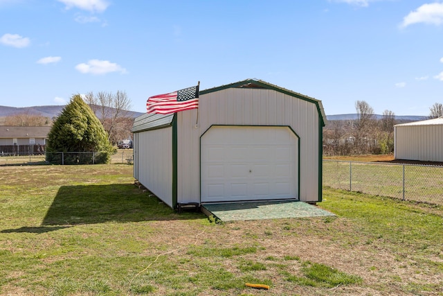 detached garage with fence