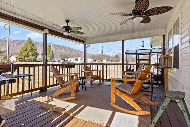 deck with a ceiling fan