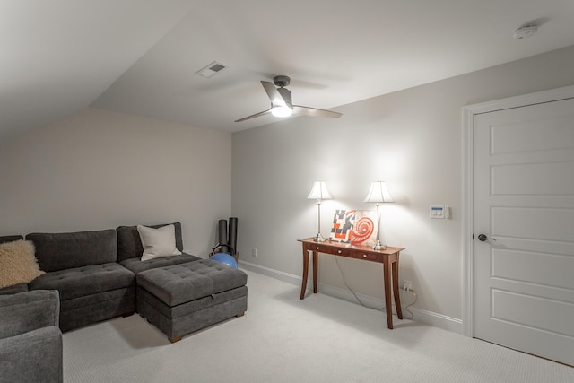 living area featuring light carpet, ceiling fan, visible vents, and baseboards