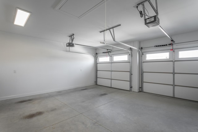 garage featuring baseboards and a garage door opener