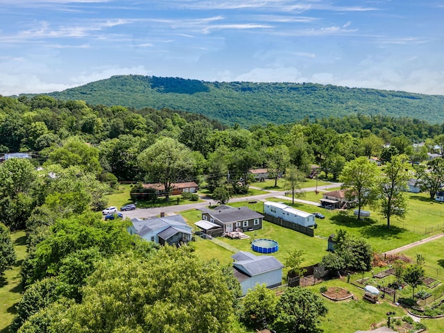 drone / aerial view with a view of trees