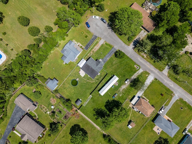 birds eye view of property with a residential view