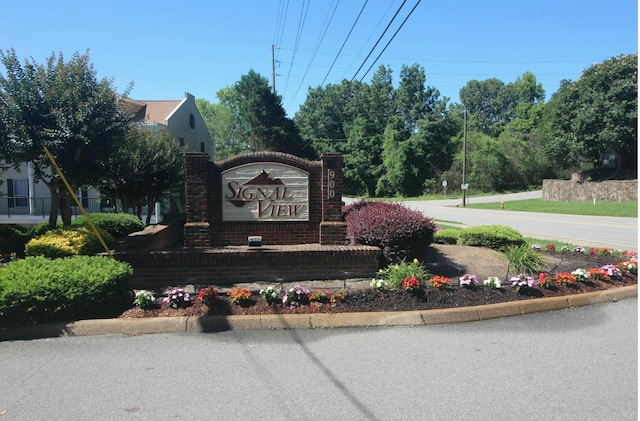 view of community sign