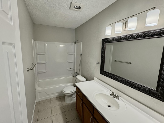 bathroom with a textured ceiling, tile patterned flooring, toilet, vanity, and shower / bathing tub combination