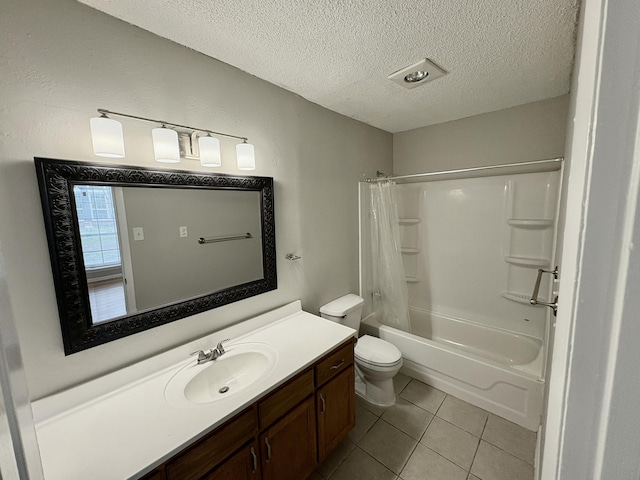 bathroom with toilet, shower / tub combo, a textured ceiling, vanity, and tile patterned flooring