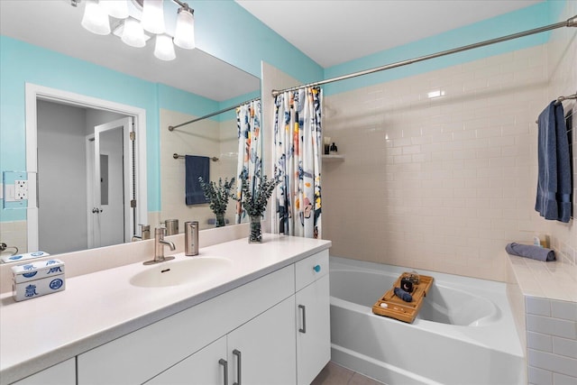 bathroom featuring shower / tub combo and vanity