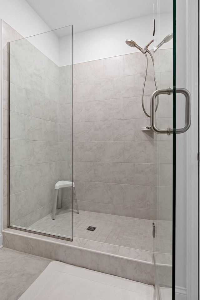 bathroom with a shower stall