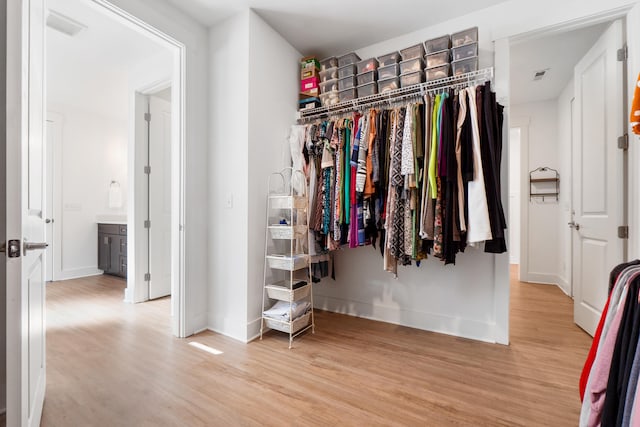 interior space featuring visible vents and light wood finished floors