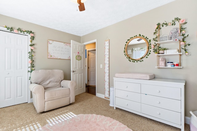 sitting room with light carpet and baseboards