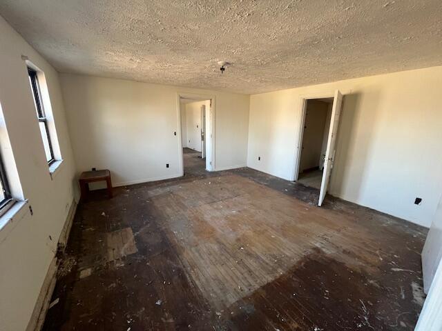 unfurnished bedroom featuring a textured ceiling