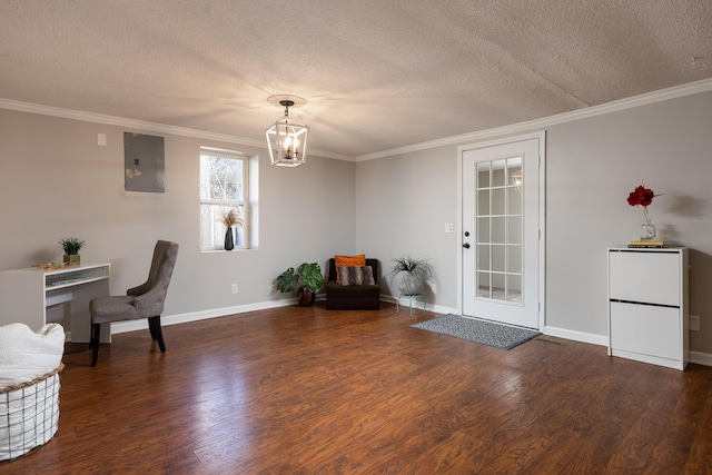 interior space with a textured ceiling, wood finished floors, electric panel, and an inviting chandelier