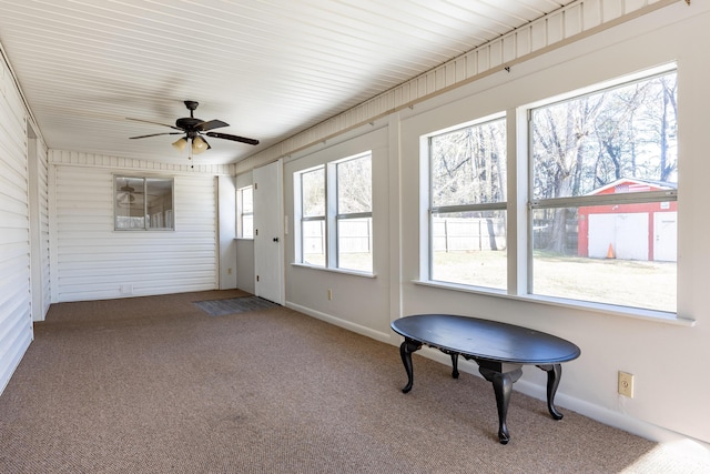 sunroom / solarium with ceiling fan