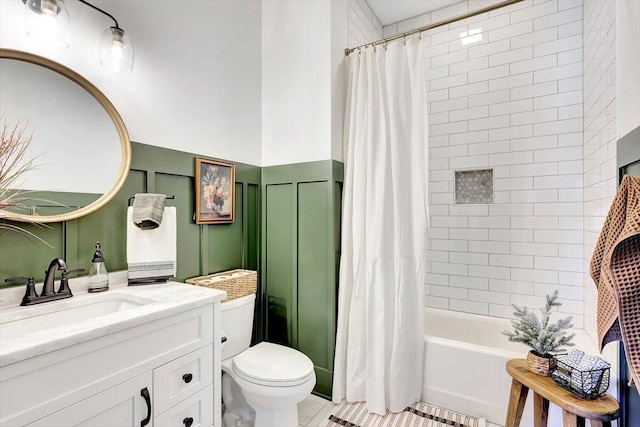 bathroom with shower / bath combo, vanity, toilet, and tile patterned floors