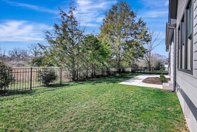 view of yard featuring a fenced backyard and a patio