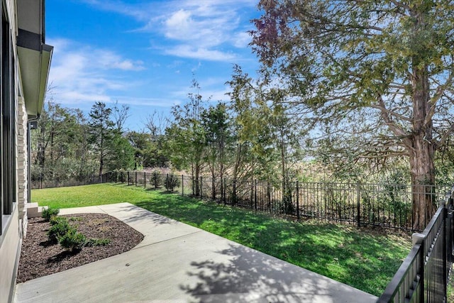 view of yard featuring a patio and a fenced backyard