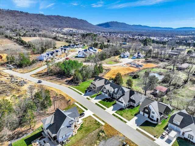 birds eye view of property with a residential view and a mountain view