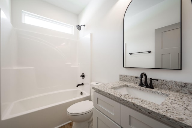 full bath with vanity, toilet, and tub / shower combination