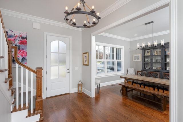 619 Hill Pointe Ln, Chattanooga, TN 37405 - entryway featuring an inviting chandelier, crown molding, dark wood-type flooring, and plenty of natural light