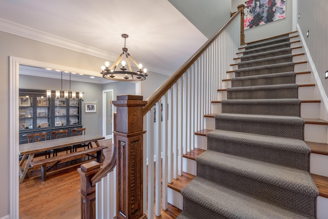 619 Hill Pointe Ln, Chattanooga, TN 37405 - stairway featuring ornamental molding, a notable chandelier, and wood finished floors