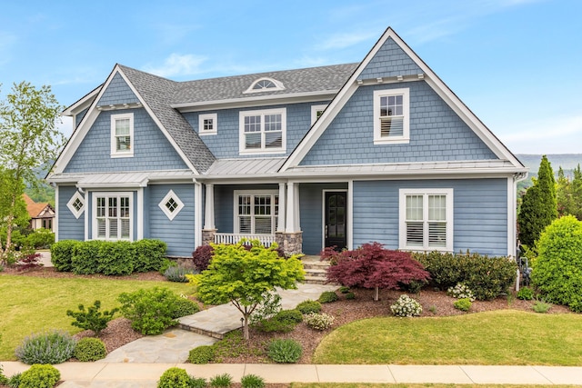 619 Hill Pointe Ln, Chattanooga, TN 37405 - view of front of home with a standing seam roof, metal roof, roof with shingles, covered porch, and a front yard