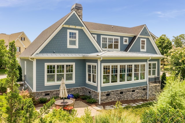 619 Hill Pointe Ln, Chattanooga, TN 37405 - rear view of house featuring a chimney, a standing seam roof, a shingled roof, metal roof, and crawl space