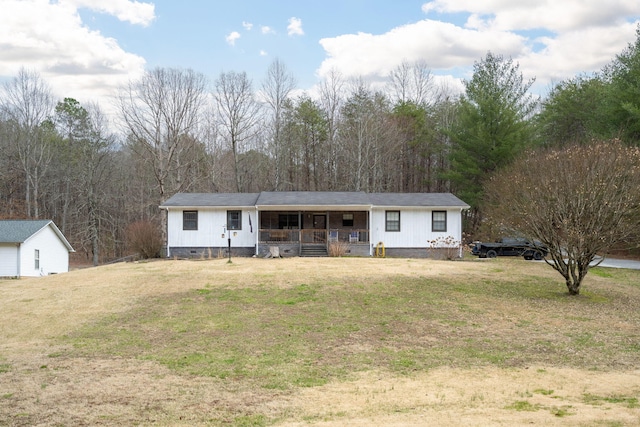 ranch-style home featuring a porch, crawl space, and a front lawn