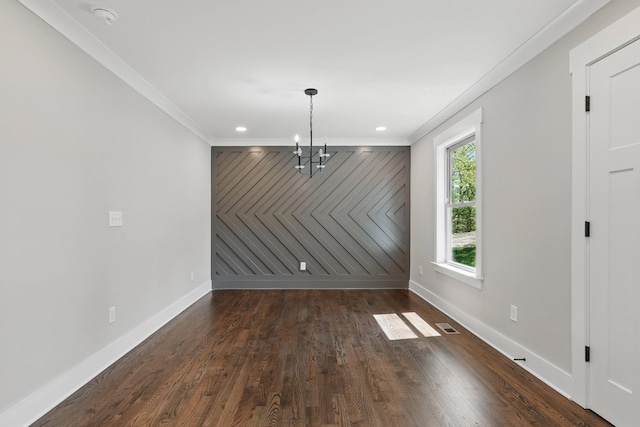 unfurnished dining area with baseboards, visible vents, and crown molding