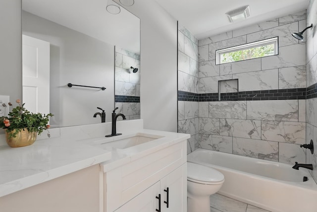 bathroom featuring shower / washtub combination, visible vents, toilet, and vanity