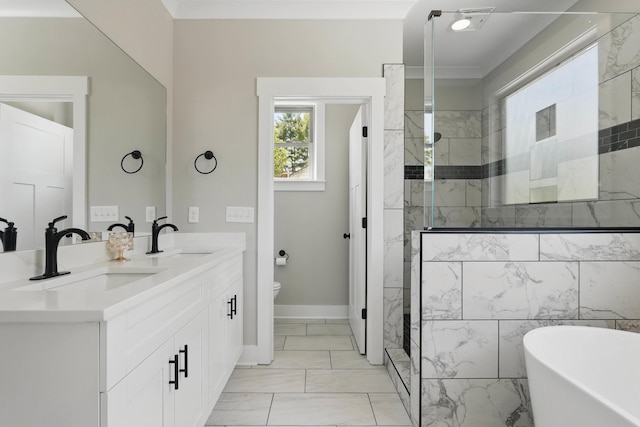 bathroom with a tile shower, toilet, marble finish floor, and a sink