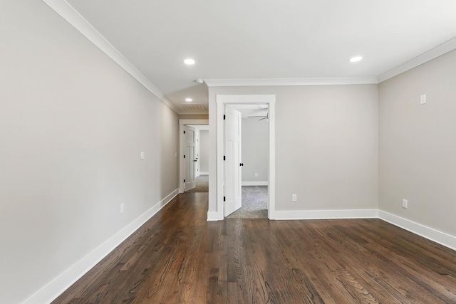 empty room with recessed lighting, ornamental molding, and baseboards